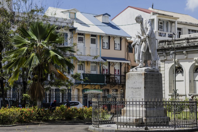 Courthouse courtyard in Ford-de-France and a statue of Victor Schoelcher